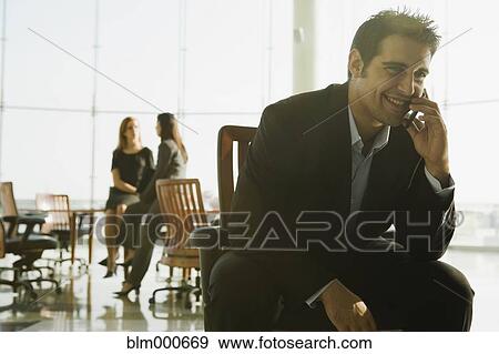 Stock Photo - Business people in conference room for meeting. Fotosearch