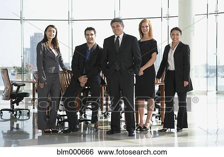 Stock Photograph - Business people in conference room for meeting. Fotosearch