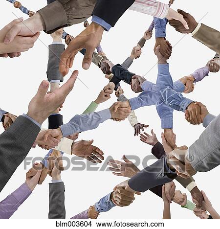 Picture - Business people shaking hands. Fotosearch