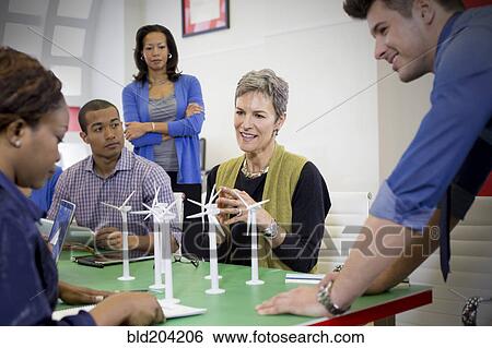 Stock Photograph - Business people talking in meeting. Fotosearch
