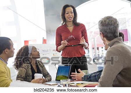 Business people talking in meeting View Large Photo Image Stock Photography - Business people talking in meeting. Fotosearch