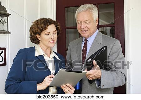 Business people using tablet computers View Large Photo Image Stock Image - Business people using tablet computers. Fotosearch