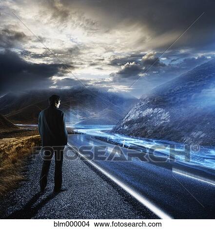 Businessman looking at highway View Large Photo Image Picture - Businessman looking at highway. Fotosearch