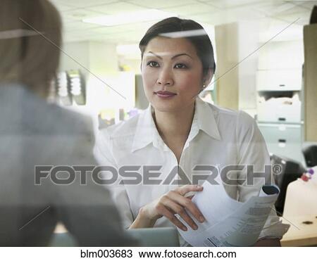 Businesswomen in meeting View Large Photo Image Stock Image - Businesswomen in meeting. Fotosearch