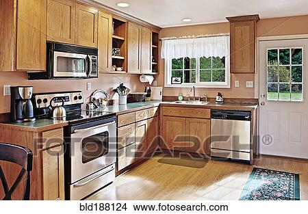 Cabinets and countertops in modern kitchen View Large Photo Image Picture - Cabinets and countertops in modern kitchen. Fotosearch