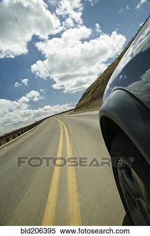 Stock Photography - Car on Roadway. Fotosearch
