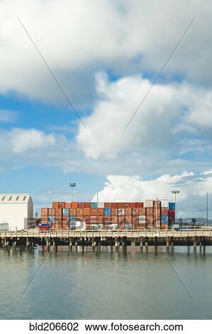 Stock Image - Cargo Shipping Containers on a Dock. Fotosearch