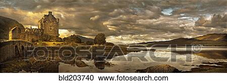 Stock Image - Castle and still rural lake, Isle of Skye, Isle of Skye, Scotland. Fotosearch