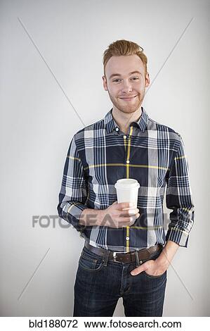 Caucasian businessman drinking coffee View Large Photo Image Stock Image - Caucasian businessman drinking coffee. Fotosearch