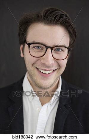 Caucasian businessman smiling View Large Photo Image Stock Image - Caucasian businessman smiling. Fotosearch