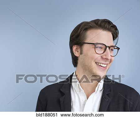 Stock Image - Caucasian businessman smiling. Fotosearch