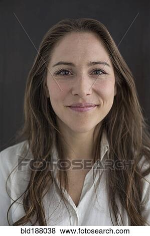 Stock Photo - Caucasian businesswoman smiling. Fotosearch