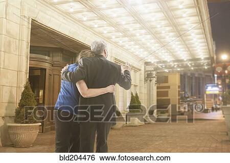 Caucasian couple hugging outdoors View Large Photo Image Stock Photograph - Caucasian couple hugging outdoors. Fotosearch