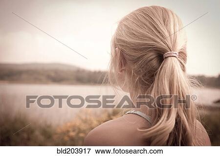 Caucasian girl overlooking rural landscape View Large Photo Image Stock Photo - Caucasian girl overlooking rural landscape. Fotosearch