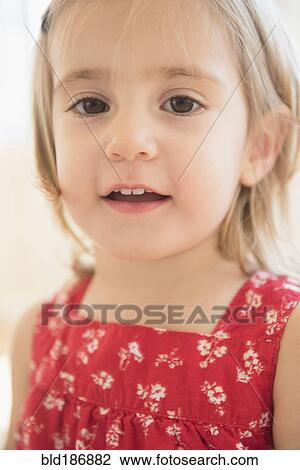 Stock Image - Caucasian girl smiling. Fotosearch