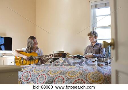 Caucasian lesbian couple relaxing in bedroom View Large Photo Image Stock Image - Caucasian lesbian couple relaxing in bedroom. Fotosearch
