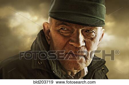 Caucasian man standing outdoors View Large Photo Image Stock Photo - Caucasian man standing outdoors. Fotosearch