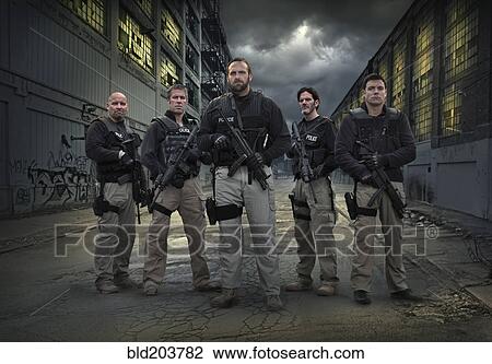 Caucasian policemen on city street View Large Photo Image Stock Image - Caucasian policemen on city street. Fotosearch