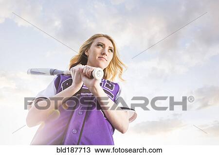 Caucasian teenage girl wearing softball uniform View Large Photo Image Stock Image - Caucasian teenage girl wearing softball uniform. Fotosearch
