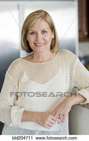 Stock Image - Caucasian woman smiling. Fotosearch