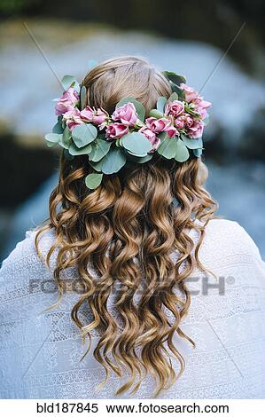 Stock Photography - Caucasian woman wearing flower crown. Fotosearch