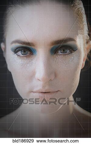 Stock Photo - Caucasian woman wearing glamorous makeup. Fotosearch
