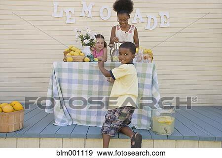 Stock Photo - Children at lemonade stand. Fotosearch