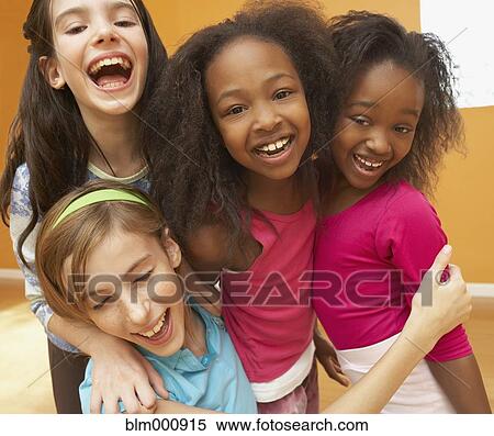 Children laughing and hugging View Large Photo Image Stock Photography - Children laughing and hugging. Fotosearch