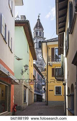 Church tower over village street View Large Photo Image Stock Photo - Church tower over village street. Fotosearch
