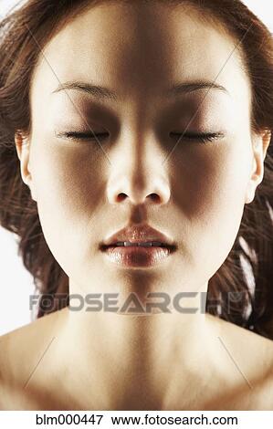 Close up Asian womanÆs face View Large Photo Image Stock Photo - Close up Asian womanÆs face. Fotosearch