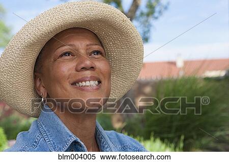 Close up of African woman smiling View Large Photo Image Stock Photography - Close up of African woman smiling. Fotosearch