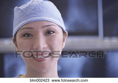 Close up of Asian female medical professional View Large Photo Image Stock Image - Close up of Asian female medical professional. Fotosearch