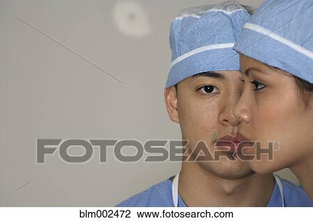 Stock Image - Close up of Asian medical professionals. Fotosearch