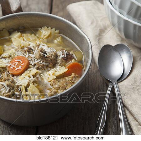 Close up of bowl of soup with spoons View Large Photo Image Stock Image - Close up of bowl of soup with spoons. Fotosearch