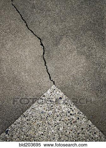 Stock Photography - Close up of crack in concrete. Fotosearch