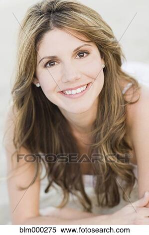 Stock Photography - Close up of Cuban woman smiling. Fotosearch