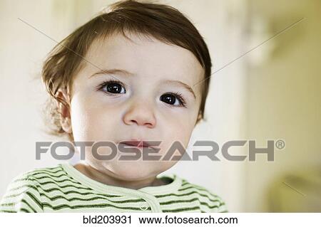 Close up of Hispanic toddler's face View Large Photo Image Stock Image - Close up of Hispanic toddler's face. Fotosearch