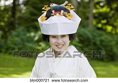Stock Image - Close up of Japanese bride wearing traditional clothing. Fotosearch