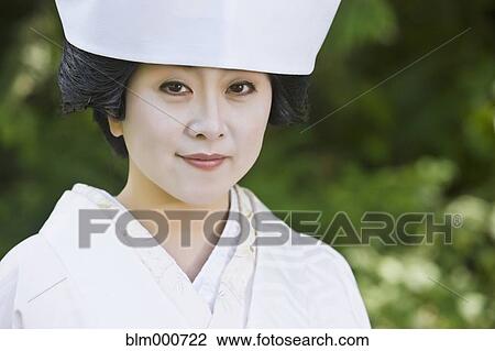 Stock Image - Close up of Japanese bride wearing traditional clothing. Fotosearch