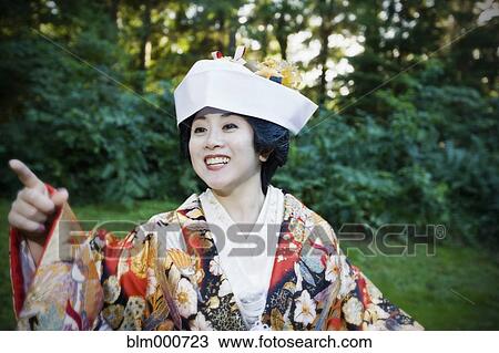 Stock Image - Close up of Japanese bride wearing traditional clothing. Fotosearch