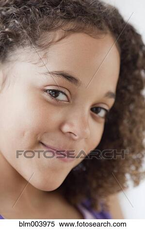 Close up of mixed race girl smiling View Large Photo Image Stock Photography - Close up of mixed race girl smiling. Fotosearch