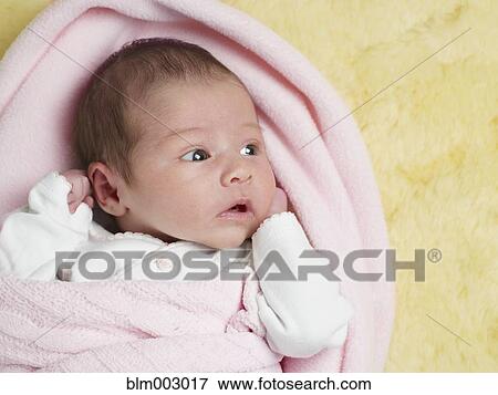 Close up of mixed race newborn baby View Large Photo Image Stock Photo - Close up of mixed race newborn baby. Fotosearch