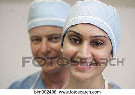 Stock Photo - Close up of multi-ethnic medical professionals. Fotosearch