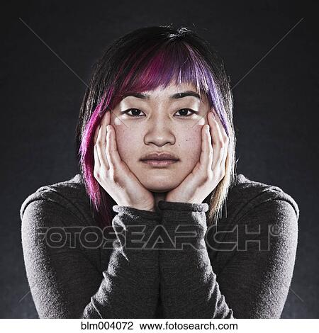 Close up of serious Japanese woman View Large Photo Image Stock Image - Close up of serious Japanese woman. Fotosearch