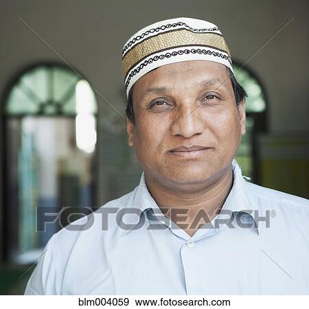 Stock Photo - Close up of smiling Asian man. Fotosearch