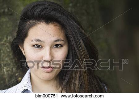 Close up of smiling Japanese woman View Large Photo Image Stock Image - Close up of smiling Japanese woman. Fotosearch