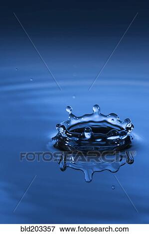 Stock Photo - Close up of water droplet splashing. Fotosearch
