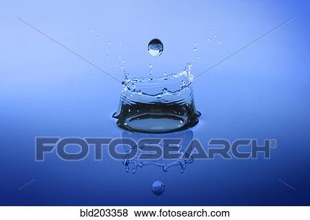 Stock Photo - Close up of water droplet splashing. Fotosearch