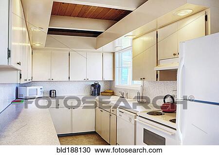 Stock Image - Countertop and cabinets in modern kitchen. Fotosearch