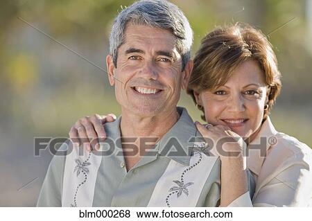 Cuban couple hugging View Large Photo Image Stock Photo - Cuban couple hugging. Fotosearch